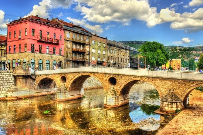 Private Walking Tour, Food Tasting and Bosnian Coffee in Sarajevo - Entering Sarajevo’s Old Core: Sebilj Brunnen and Bascarsija Square